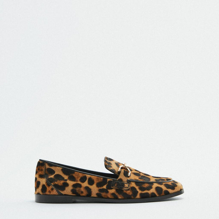MOCASSINO ANIMALIER CON DETTAGLIO METALLICO